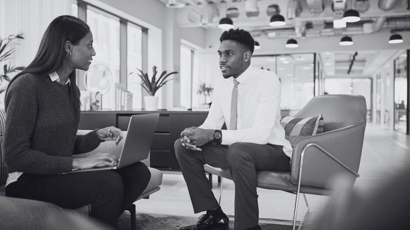 Hiring manager and candidate in interview
